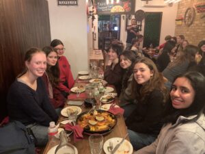 Students speaking Spanish at local tapas restaurant trip